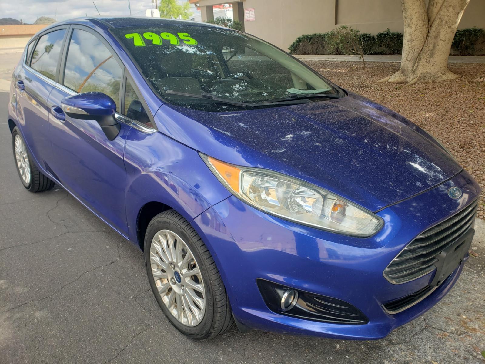 2014 /Tan and black Ford Fiesta Titanium (3FADP4FJ5EM) with an 1.6l i4 engine, 6-Speed Automatic transmission, located at 323 E Dunlap Ave., Phoenix, AZ, 85020, (602) 331-9000, 33.567677, -112.069000 - 2014 Ford Fiesta Titanium,.......A Must See!!... No accidents, Only 95K MILES.... Ice cold AC. The car is gorgeous inside and out. Power windows, Power door locks, Touch screen Stereo/ CD Player, Phone sync, Bluetooth, Satellite compatible, Backup camera, Beautiful tan and black interior with tan le - Photo #2